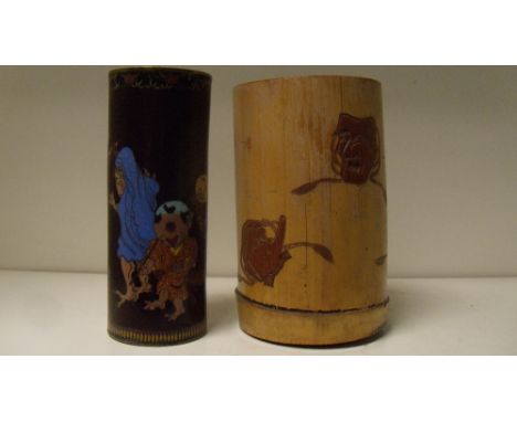 A 20th century bamboo and a cloisonne brush pot, the straw yellow cylindrical exterior of the first carved through to the und