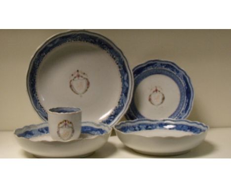 Five late 18th/early 19th century tea wares initialled G within a shield garlanded with flowers within blue rim bands, compri