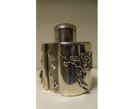 Hung Chong & Co', Shanghai, c.1900, a silver tea caddy and cover modelled as a section of tree trunk with small branches bear