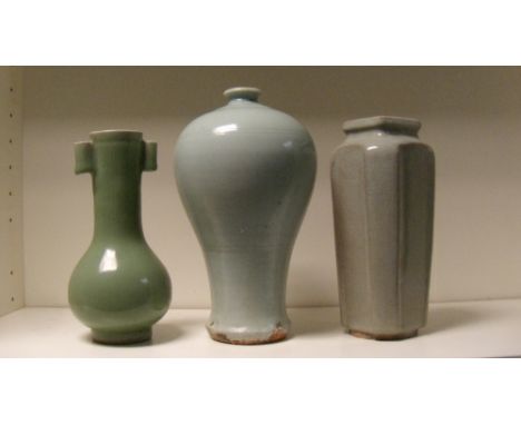 Three celadon vases, the oldest possibly Ming, the meiping shape under a pale green glaze, 24cm (9.5 in) high, the arrow vase