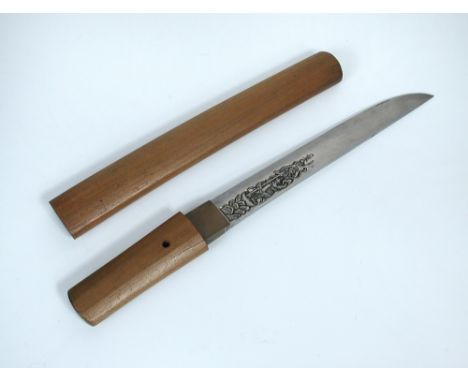 A tanto, possibly 14th century, signed Kaneuji, with Shirasaya scabbard, the hamon kamidare, the blade later carved on one si