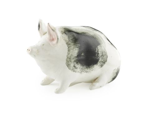 A SMALL WEMYSS WARE PIG  CIRCA 1900   sponged black on white, impressed mark WEMYSS WARE/ R. H. &amp; S., and retailer's stam