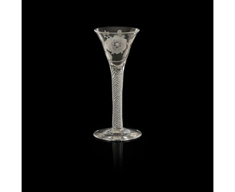 A JACOBITE ENGRAVED WINE GLASS  18TH CENTURY   the flared bowl engraved with a rose head flanked by open and closed buds, wit