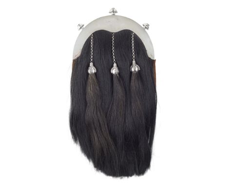 A VICTORIAN DRESS SPORRAN  R &amp; H B KIRKWOOD, EDINBURGH   the plain arched cantle with triple knops, the black goat hair b