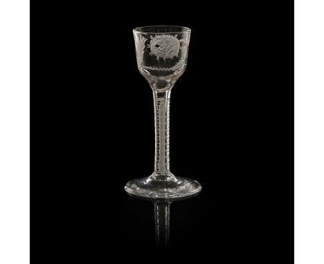 A JACOBITE WINE GLASS  18TH CENTURY   the bucket shaped bowl, with engraved rose head and closed bud, flanked by a thistle, r