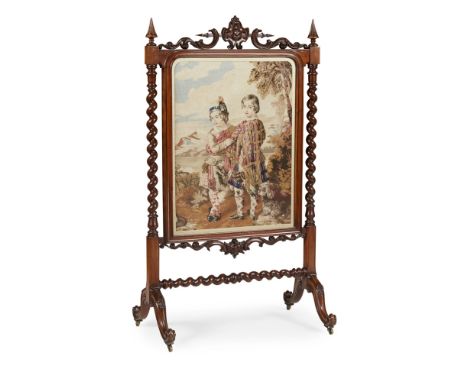 A SCOTTISH VICTORIAN MAHOGANY AND NEEDLEWORK FIRESCREEN  MID-19TH CENTURY   the needlework panel depicting two boys in Scotti