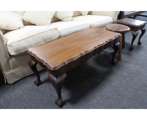 A mahogany coffee table together with a lamp table and a stool 