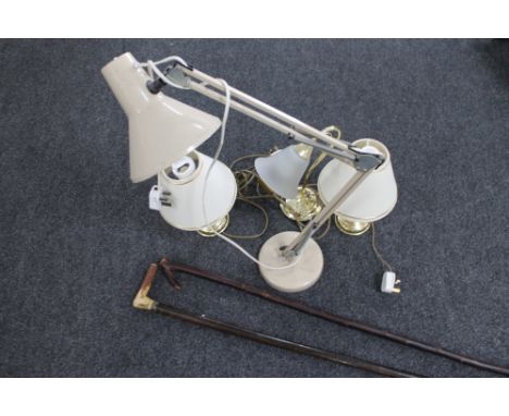 A metal angle poised lamp and three further lamps 