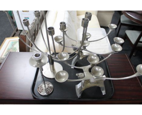 A pair of ornamental white metal candelabrum, candlestick etc 