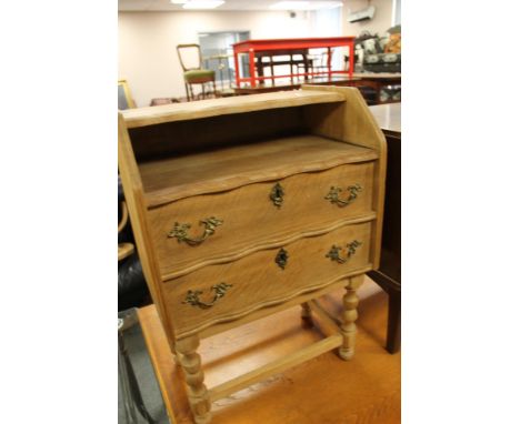 A light oak two drawer telephone table 