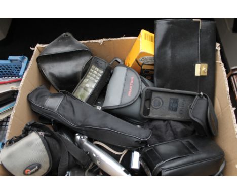 A box of assorted cameras including Kodak, Pentax, Praktica, binoculars, camera tripod etc 