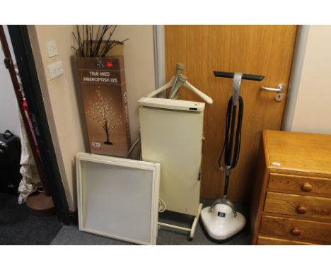 An electric trouser press, floor buffer, light box, fibre optic tree and a girl's bike
