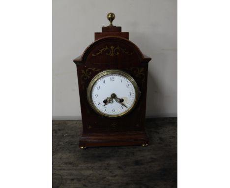 An Edwardian inlaid mahogany mantel clock 