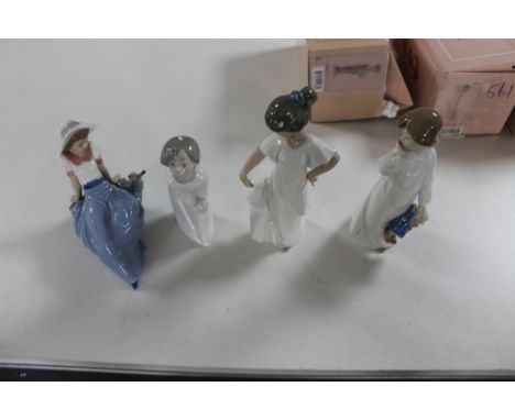 Four Nao figures of children 