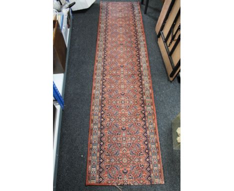 An eastern carpet runner, 67cm by 279cm