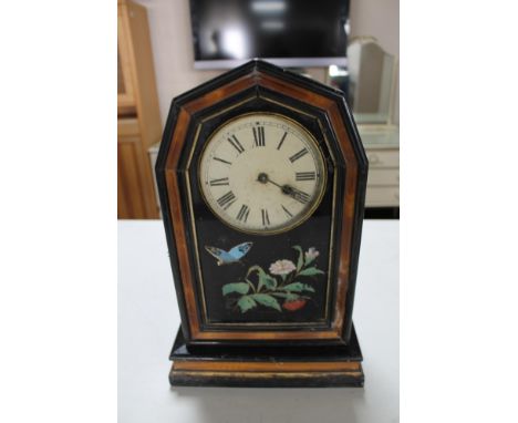 A 19th century lacquered wooden mantel clock 