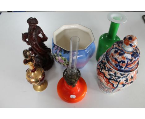 A tray of Imari patterned lidded jar, glass oil lamp, eastern figure 