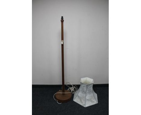A mid 20th century teak standard lamp and shade 