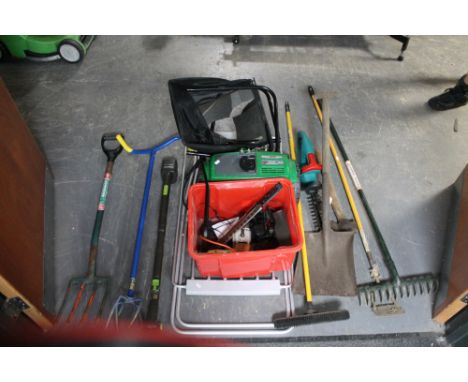 A quantity of garden tools, clothes rack, G-tech cordless mower (a/f) 