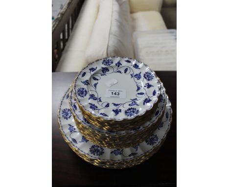 A quantity of Spode Blue Colonel blue and white gilded plates 