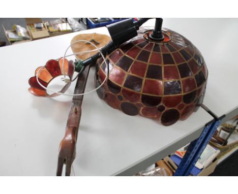 A vintage light fitting together with a mandolin 