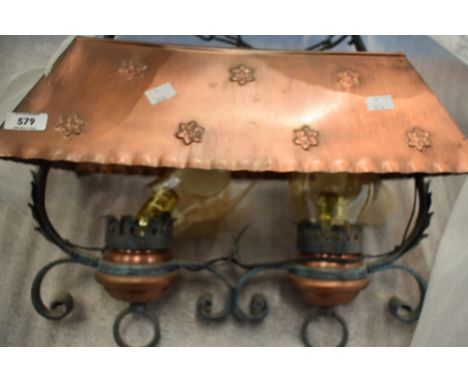 A selection of copper and wrought metal light fittings