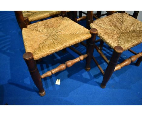 A set of six 19th century rush seated ladder back chairs