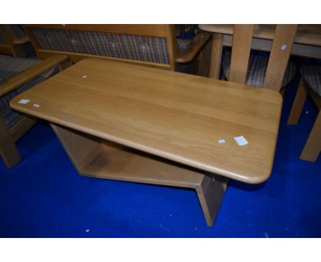 A modern light wood coffee table, of similar design to lots 629 &amp; 630, approx. 129 x 70cm