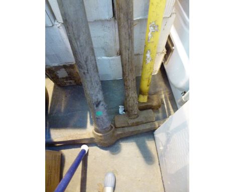 Two sledge hammers and a pick axe