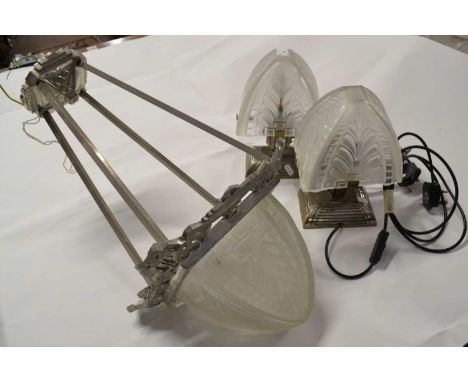 An Art Deco chrome and moulded frosted glass ceiling light fitting of tapering form, 60cm high together with a pair of simila