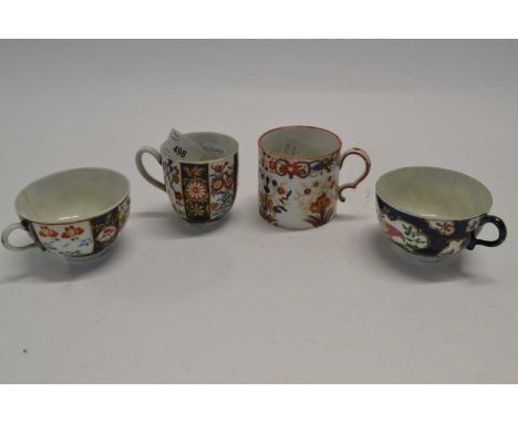 An 18th Century Worcester porcelain cup, the blue ground with Kakiemon designs together with a further cup with the Sir Joshu