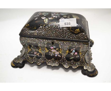 An ebonised Victorian caddy with inlaid mother of pearl decoration, 23cm long