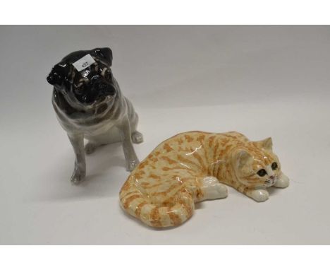 A Winstanley model of a cat with light brown markings together with a model of a Pug, 30cm high