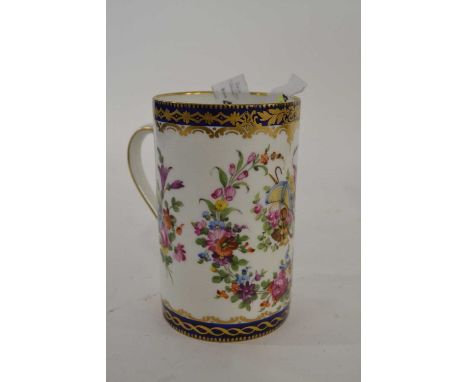 A late 19th century Samson porcelain tankard finely painted with floral sprays within blue and gilt borders in 18th century W