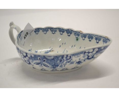An 18th Century Worcester porcelain sauce boat with the doughnut tree pattern (two chips to rim)