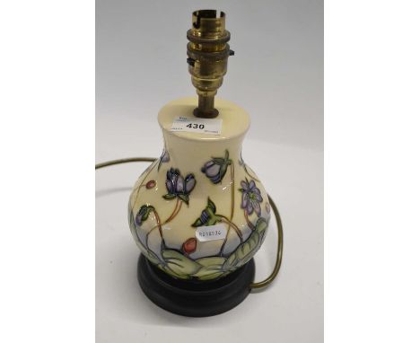 A further Moorcroft table lamp with a tubelined floral decoration