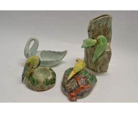 Group of Radford pottery models including a rare model of a swan together with wall pockets modelled with birds