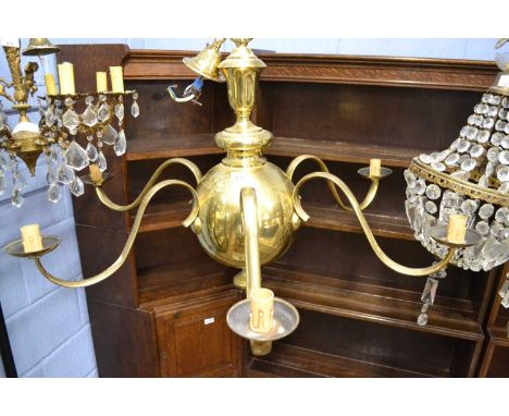 A large brass six branch ceiling light fitting in the Dutch style, approx 90cm wide