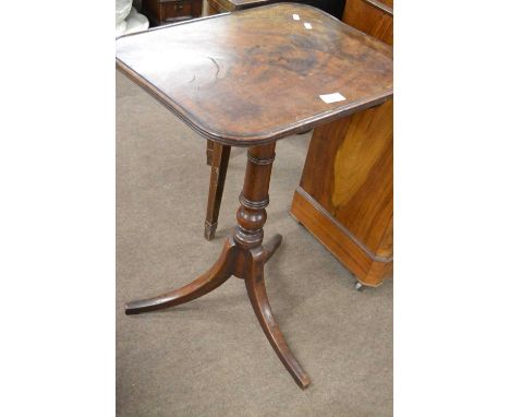 A Georgian mahogany wine table with rectangular top, turned column and a tripod base, top 50cm wide