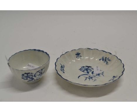 An 18th Century Worcester porcelain tea bowl and saucer of fluted shape with the Carnation pattern
