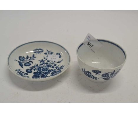 An 18th Century Worcester porcelain tea bowl and saucer with a printed floral pattern