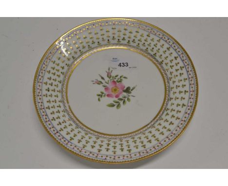 A Swansea porcelain plate the floral centre bordered by a chevron design in gilt and green, 20cm diameter