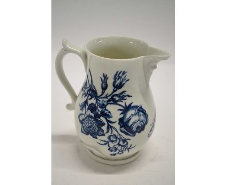 An 18th Century Worcester porcelain mask jug with printed floral decoration, 14cm high