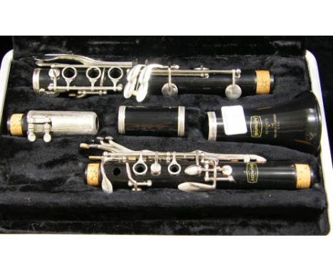 Bundy by Selmer Resonite clarinet, no. 1136697, case; together with a Graduate clarinet, no. 963172, case and a Stagg 77-C cl