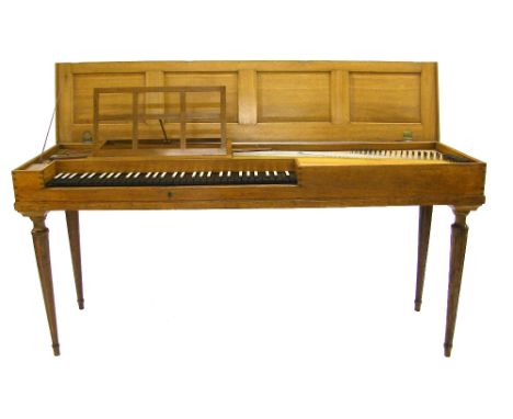An unfretted clavichord by Johann David Schiedmayer, Erlangen, 1791, the case of oak with frame and panel lid, the area beyon