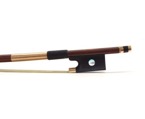 Gold mounted viola bow stamped Emile Ouchard, the stick round, the frog inlaid with large pearl eyes and the ebony adjuster w