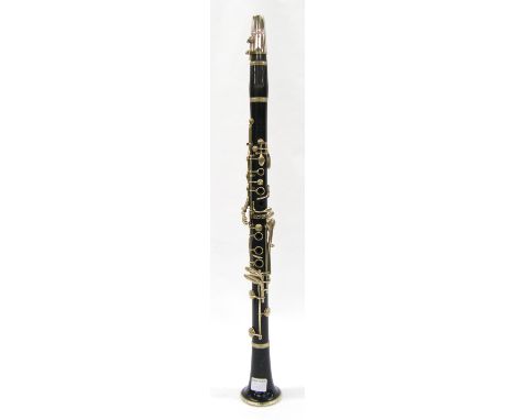 French blackwood clarinet by and stamped Couesnon & Cie, a Paris, case