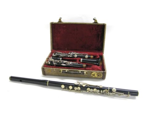 Boosey & Hawkes Regent ebonite clarinet, ser. no. 443111, case; together with a blackwood and nickel mounted flute (2)