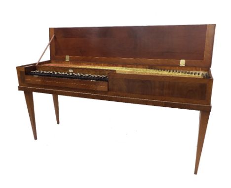 An unfretted clavichord by Johann Gottlob Horn, Dresden, 1789. the oak case veneered with mahogany panels with holly stringin