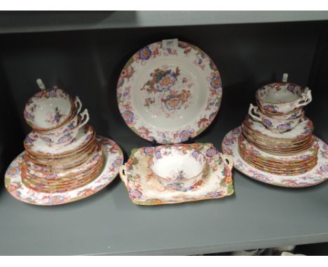 A part dinner service by Cauldon, hand decorated enamel detail 